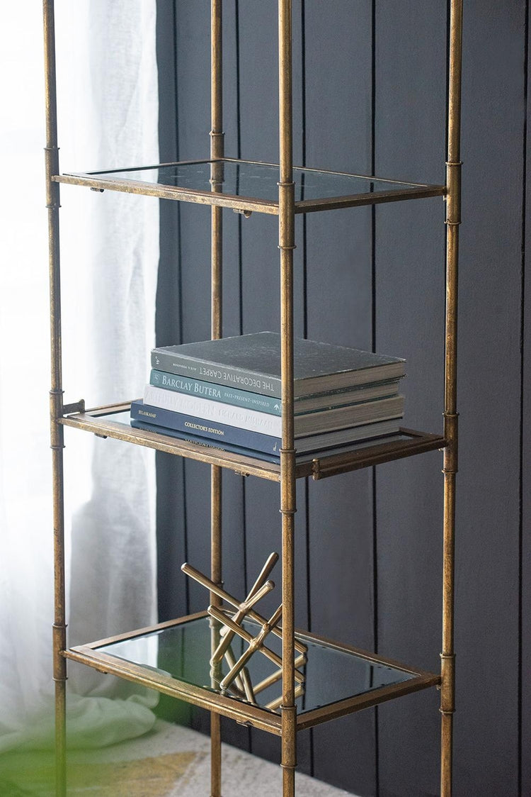 Perisa Mirror Shelf: a rectangular wall-mounted unit with a reflective mirrored front surface and open shelving below.