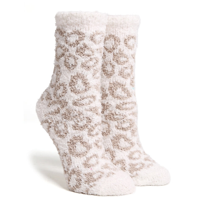 Pair of soft, white and tan leopard print mini crew winter socks made of fuzzy microfiber.
