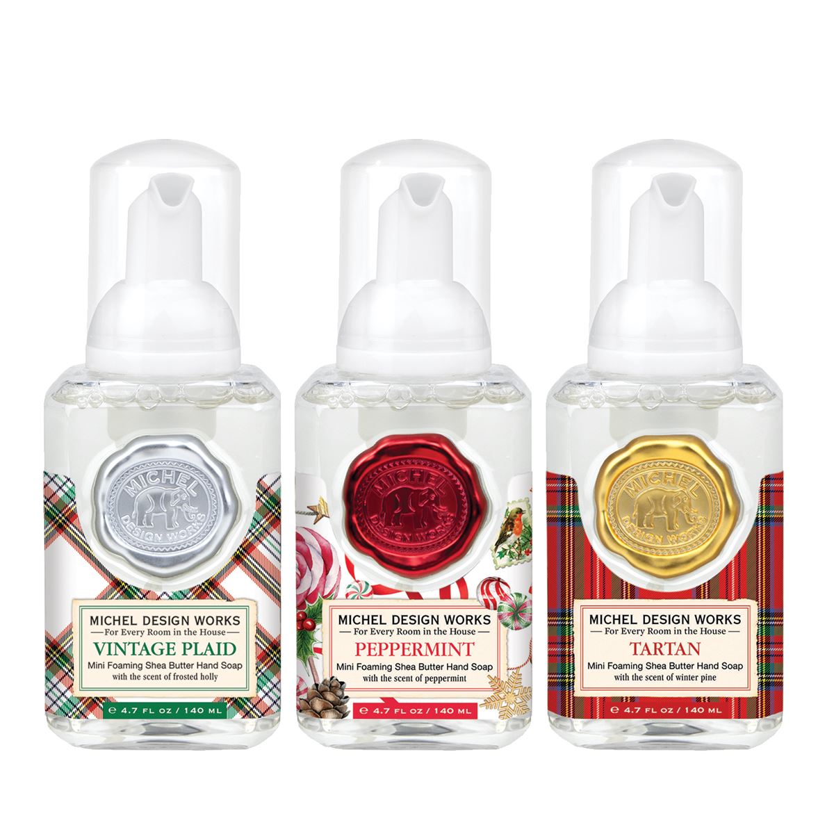 Set of three mini foaming soap dispensers in complementary scents with varied designs.