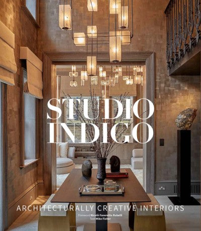 Hardcover book cover featuring Studio Indigo architectural interiors portfolio with elegant typography.