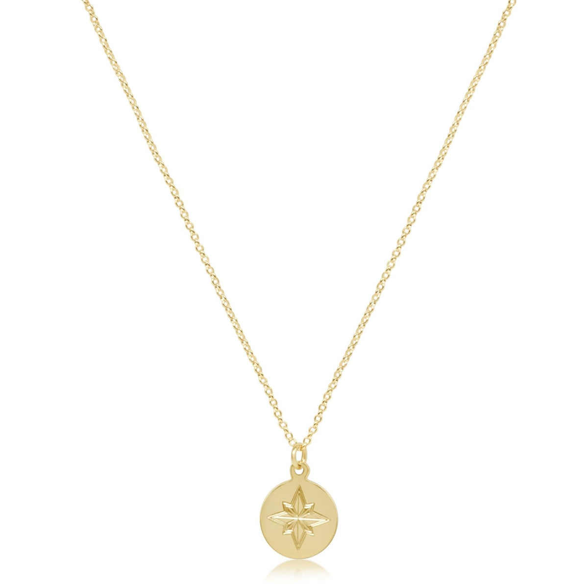 A 16-inch gold-filled chain featuring a directional disc pendant.