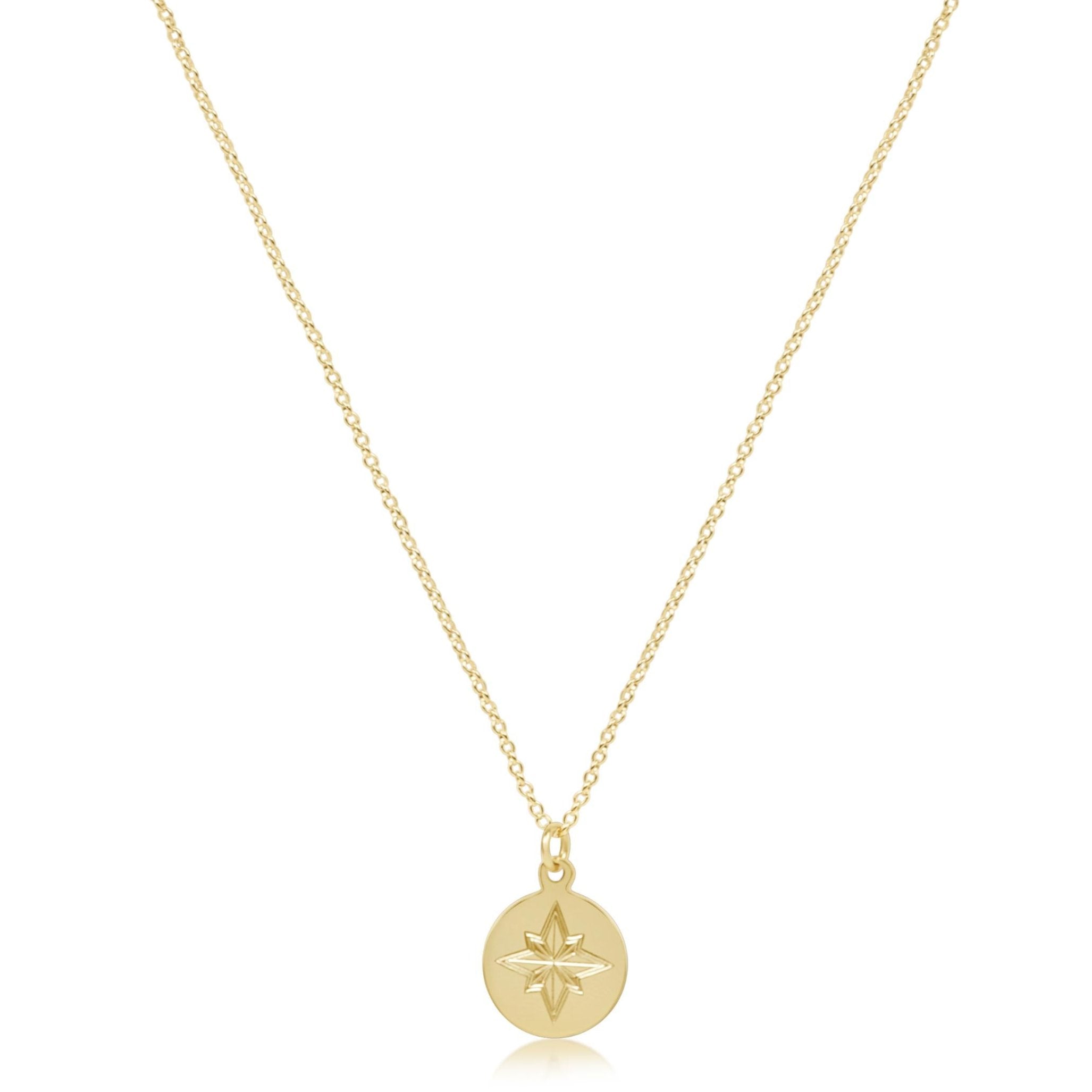 A 16-inch gold-filled chain featuring a directional disc pendant.