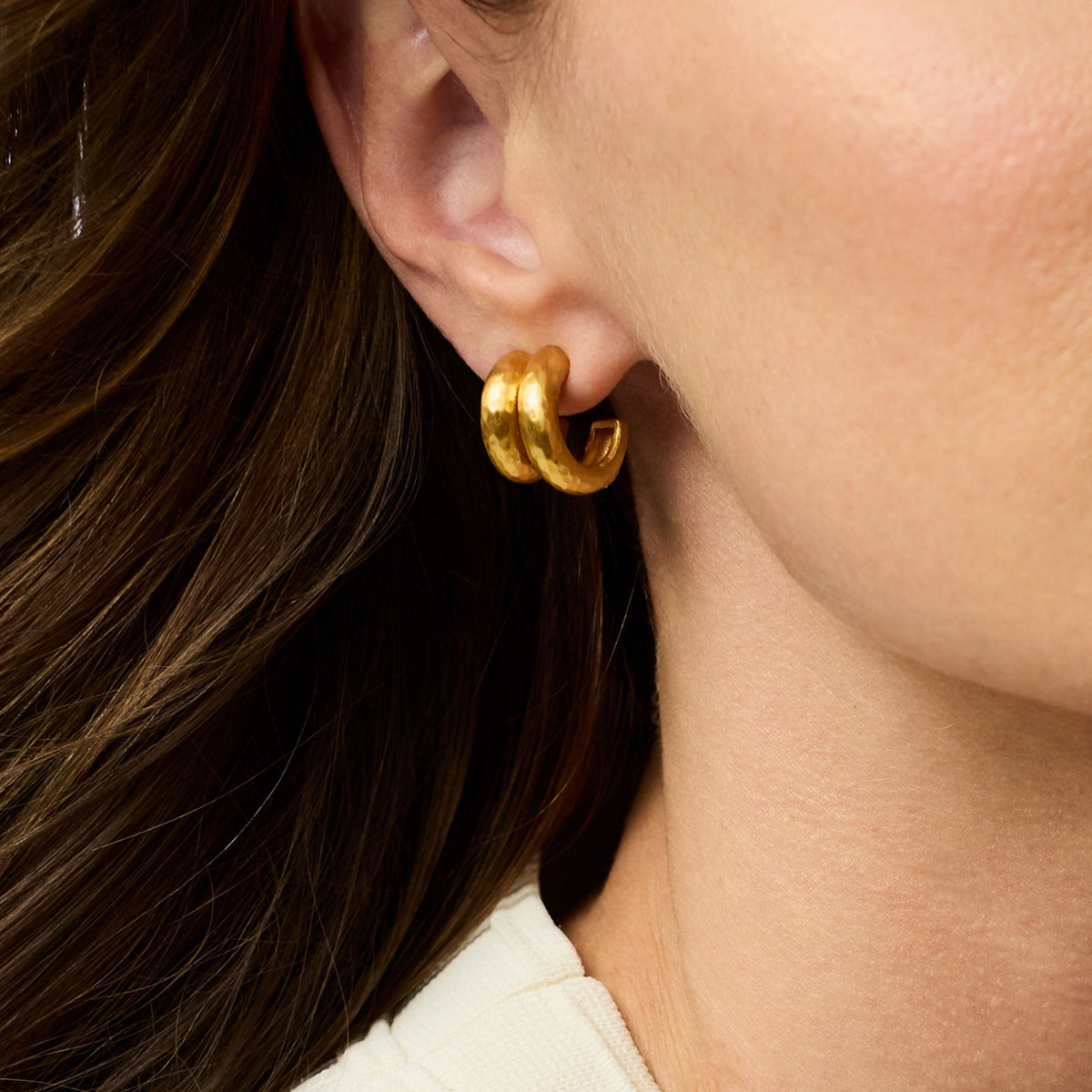 Havana Double Hoop earrings in polished gold metal with a smooth circular silhouette.