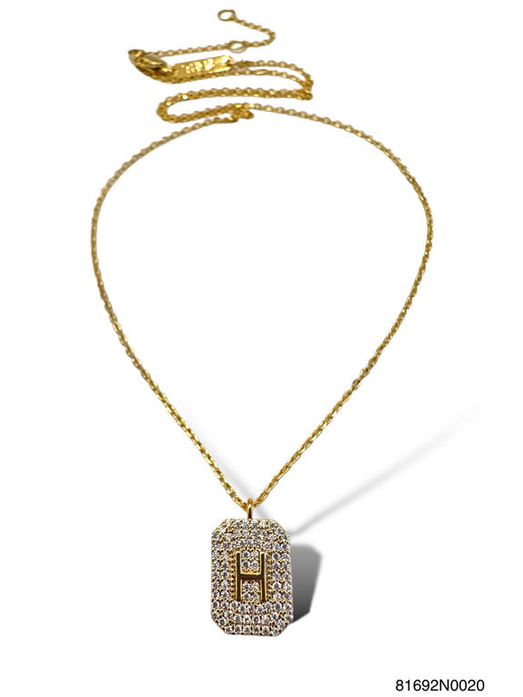 Gold initial pave tag necklace featuring a rectangular pendant with the letter H in crystals.