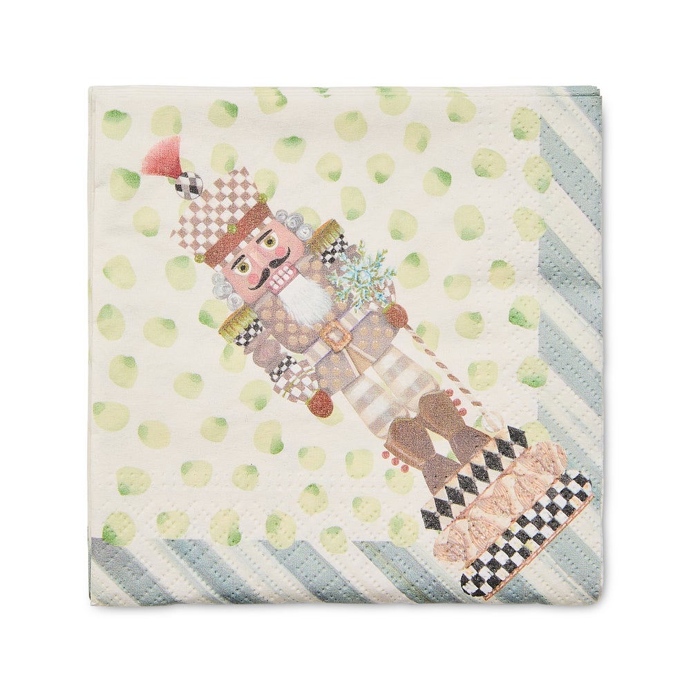 Nutcracker Cocktail Paper Napkins featuring a whimsical nutcracker on a polka dot background.