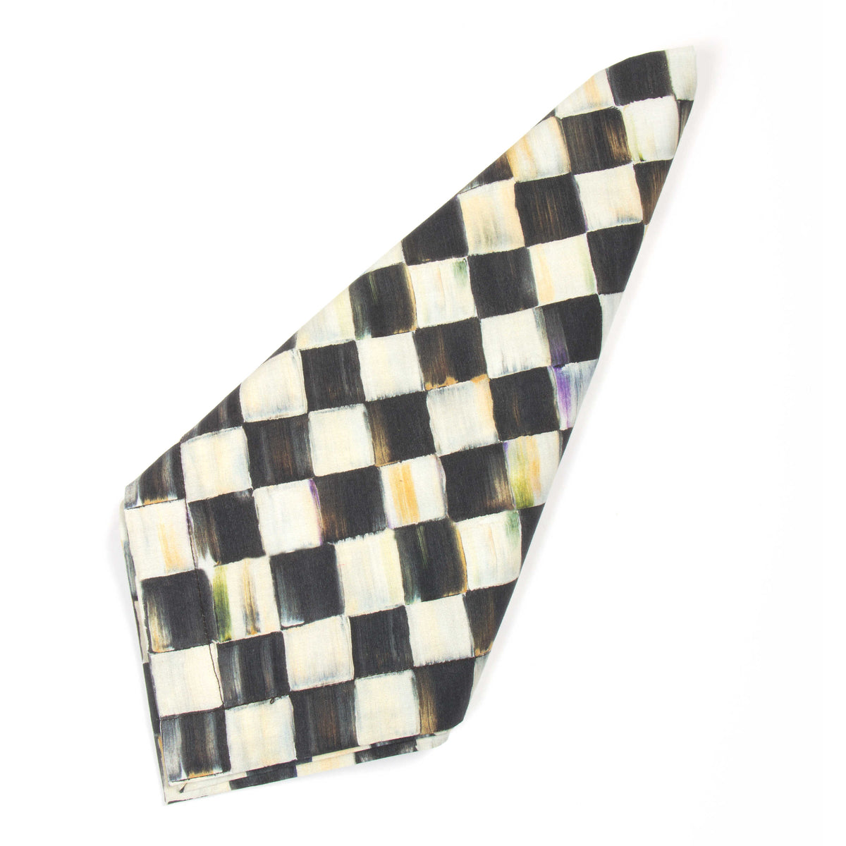 Folded cotton napkin featuring a hand-painted black and white Courtly Check pattern.