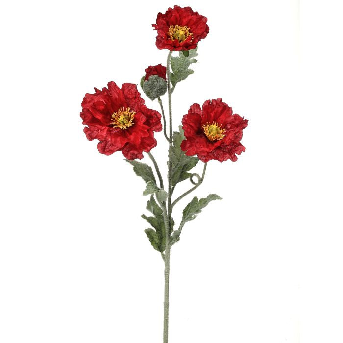 Three artificial wild poppy spray stems with red petals in a clear vase.