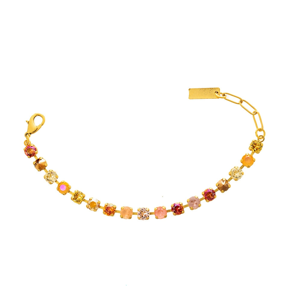 Sarina Bracelet featuring multi-colored crystals on an antique gold-plated brass chain.