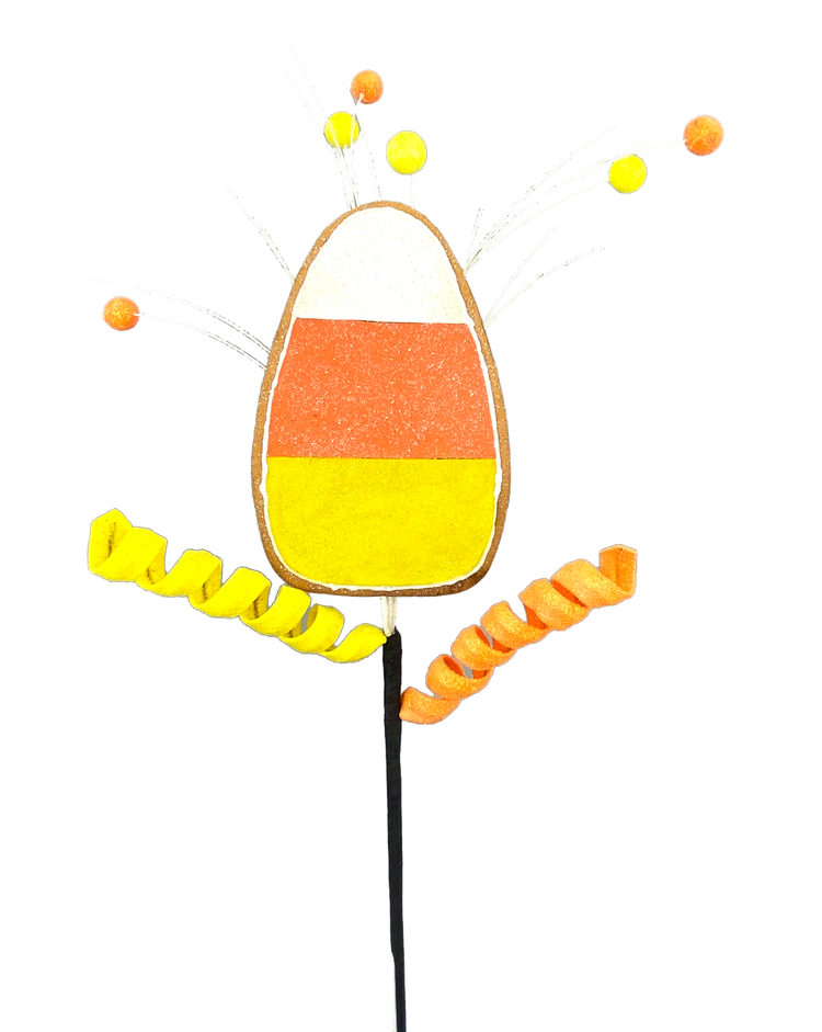 Candy corn cookie spray decoration with orange and yellow silicone molds shaped like candy corn.