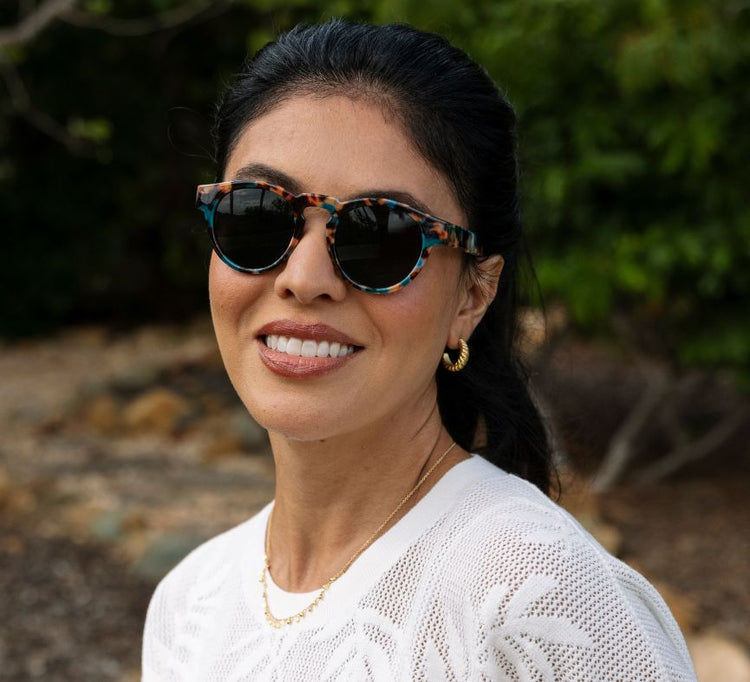 Nantucket Reading Sun sunglasses with recycled polycarbonate frames in a light neutral tone and blue-tinted lenses.