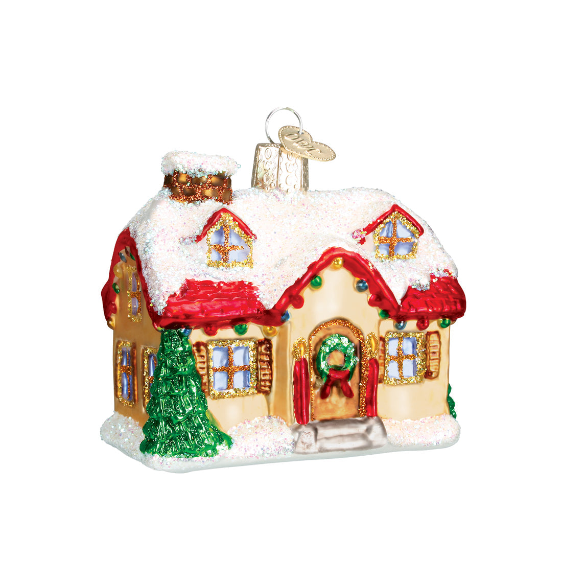 Glittery glass cottage ornament with a snow-covered roof, Christmas tree, and festive wreath.