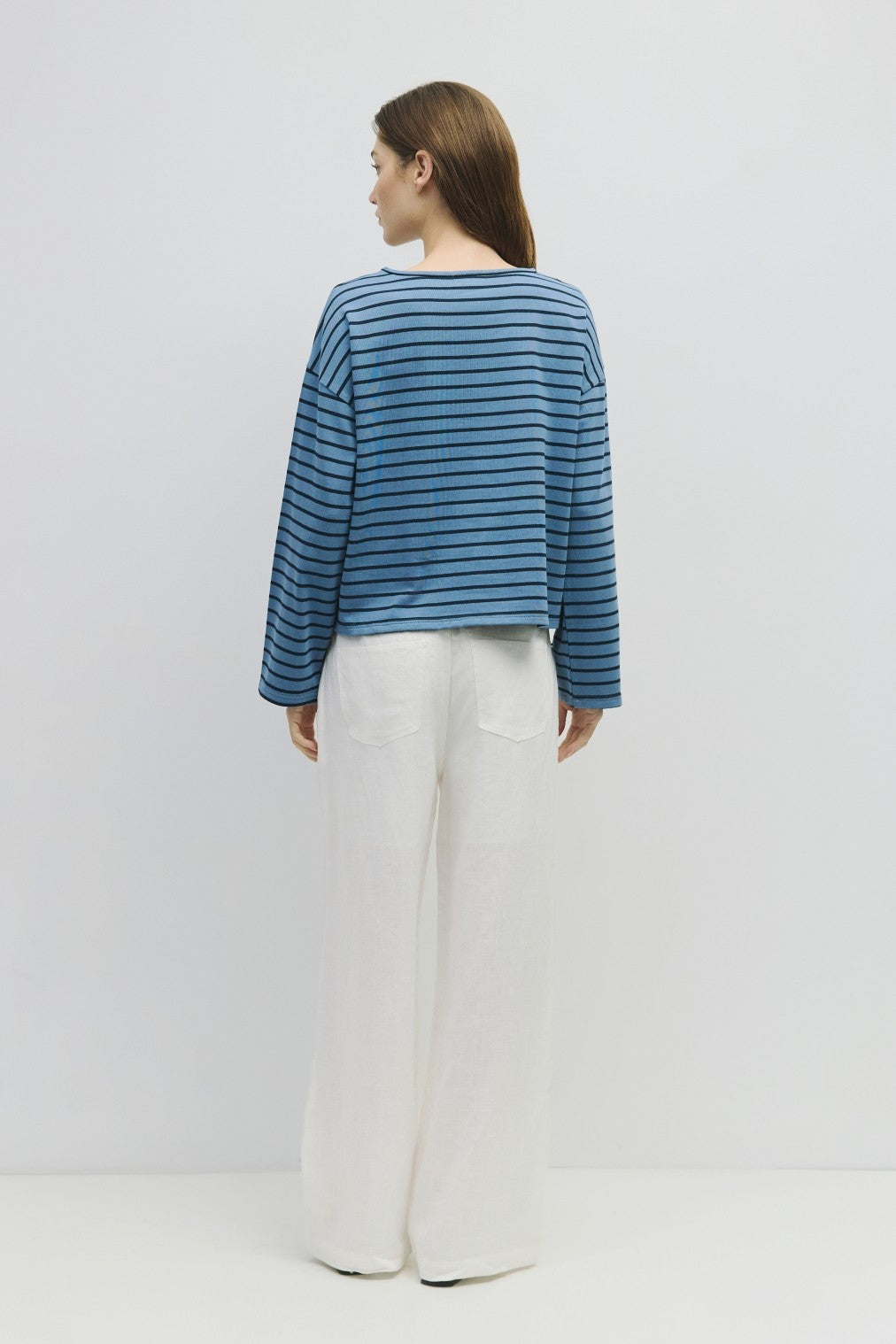 Nica The Moore Top in white cotton with a relaxed fit.