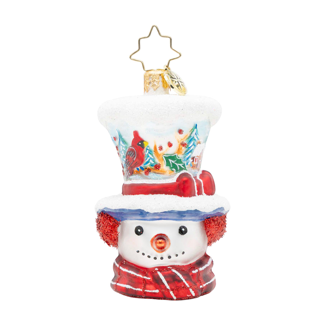 Snowman head ornament wearing a top hat with a painted cardinal and winter scene.