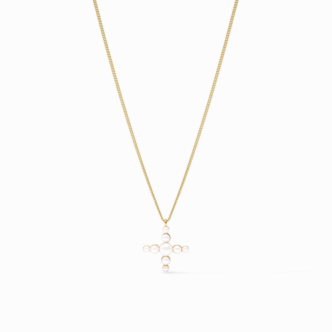 Delicate gold-plated cross necklace with reconstituted gemstone beads on a curb chain.