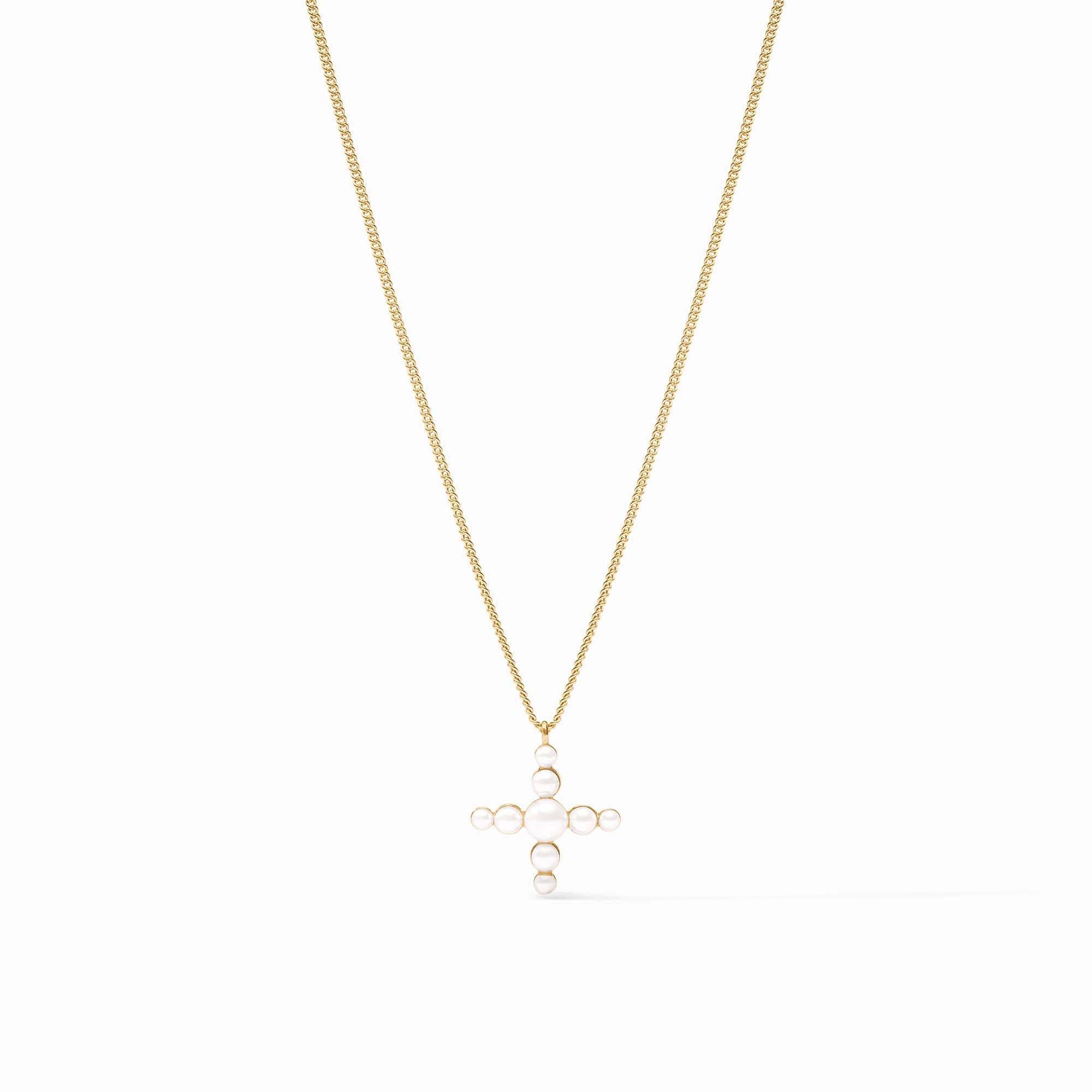 Delicate gold-plated cross necklace with reconstituted gemstone beads on a curb chain.