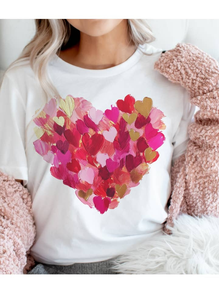 Unisex poly cotton blend graphic tee featuring a watercolor brushstroke heart in red and white.