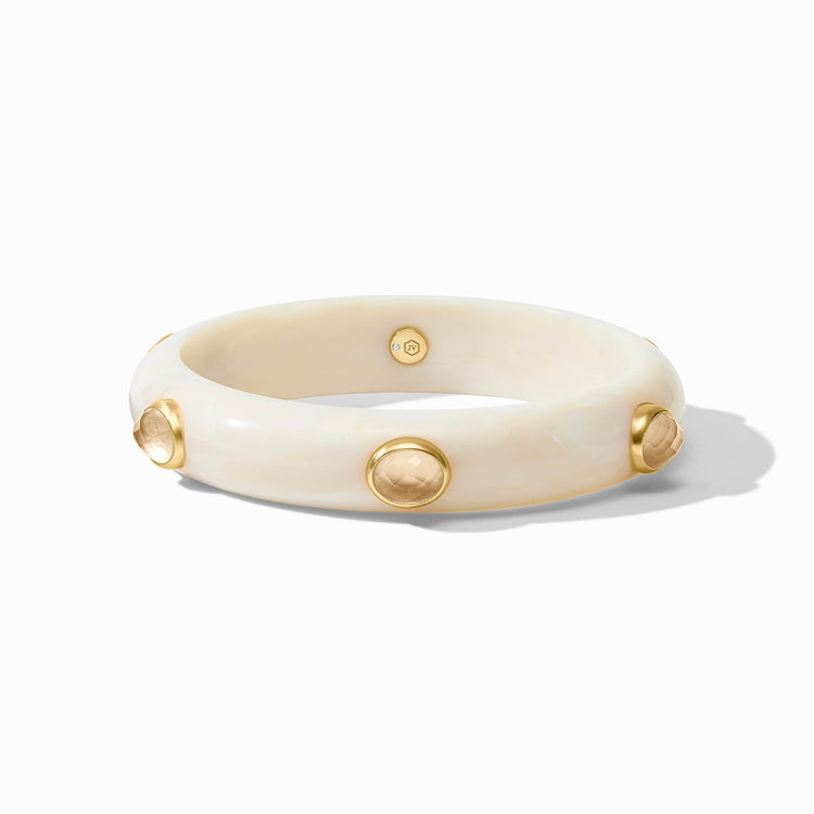 Sleek Carnaby Stone bangle in acetate with a gold plate finish and imported glass accent.