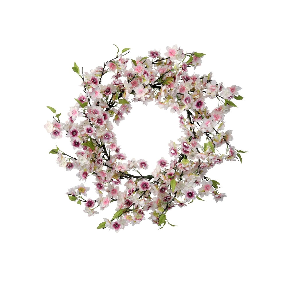 24-inch artificial cherry blossom wreath with pink flowers and greenery on a plastic frame.