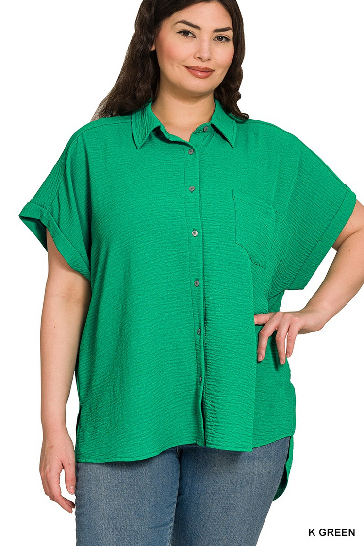 Plus size green woven airflow button-down shirt with short sleeves and a chest pocket.