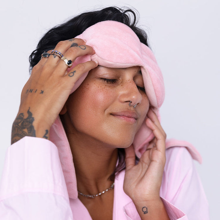 A rectangular cotton eye mask measuring 29 by 4 inches with a weight of 9 ounces.