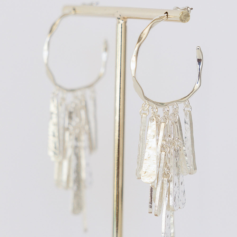Gold-plated Ellis hoop earring with a smooth circular silhouette.