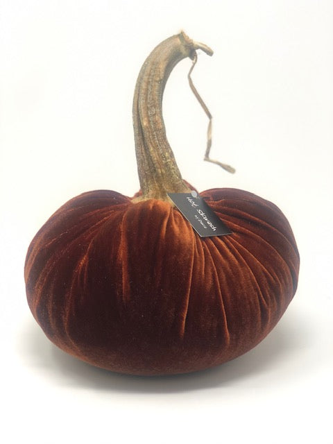 Handmade 8-inch velvet pumpkin in deep orange with a natural stem.