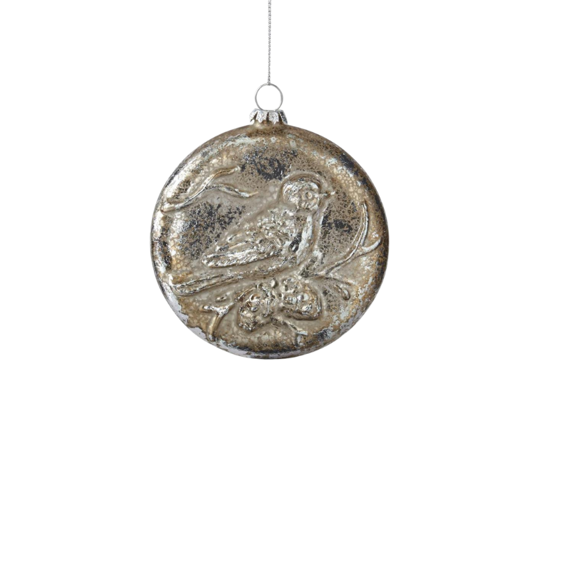 4.5 inch silver mercury glass ornament with an embossed perched bird design.