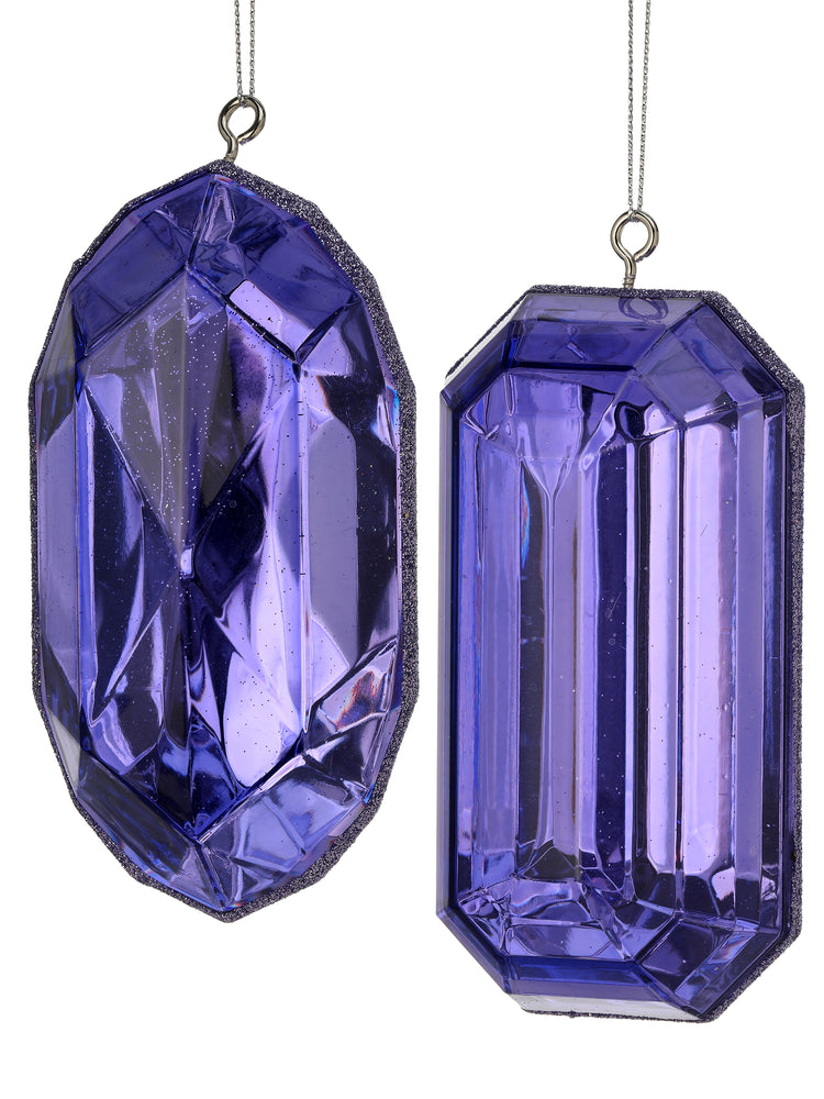 Two purple acrylic gem-shaped ornaments with faceted surfaces and glittered edges.