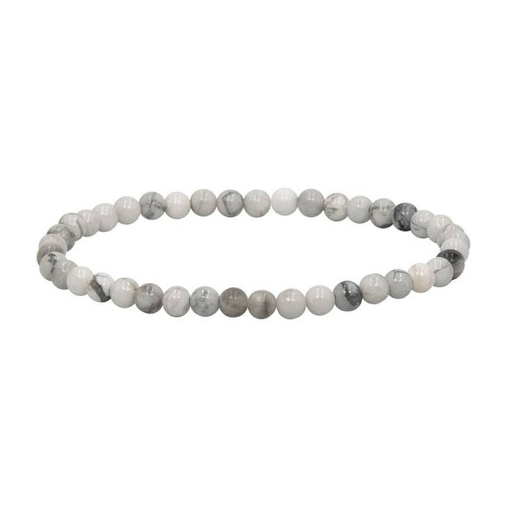 Mini Gemstone Bracelet featuring a classic beaded design with small gemstones in neutral tones.