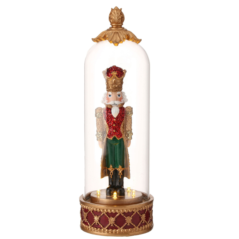13.5-inch resin nutcracker in a glass cloche with LED lights and a gold decorative base.