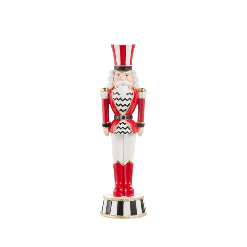 Red and white striped top hat nutcracker with a chevron patterned jacket on a striped base.