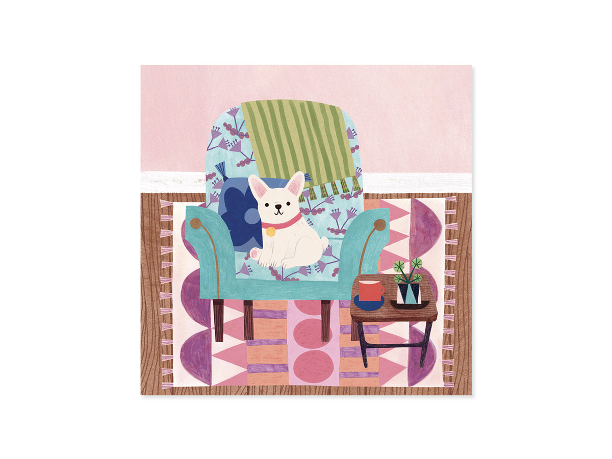 Mother's Day card illustration of a white dog sitting on a teal armchair with gold foil accents.