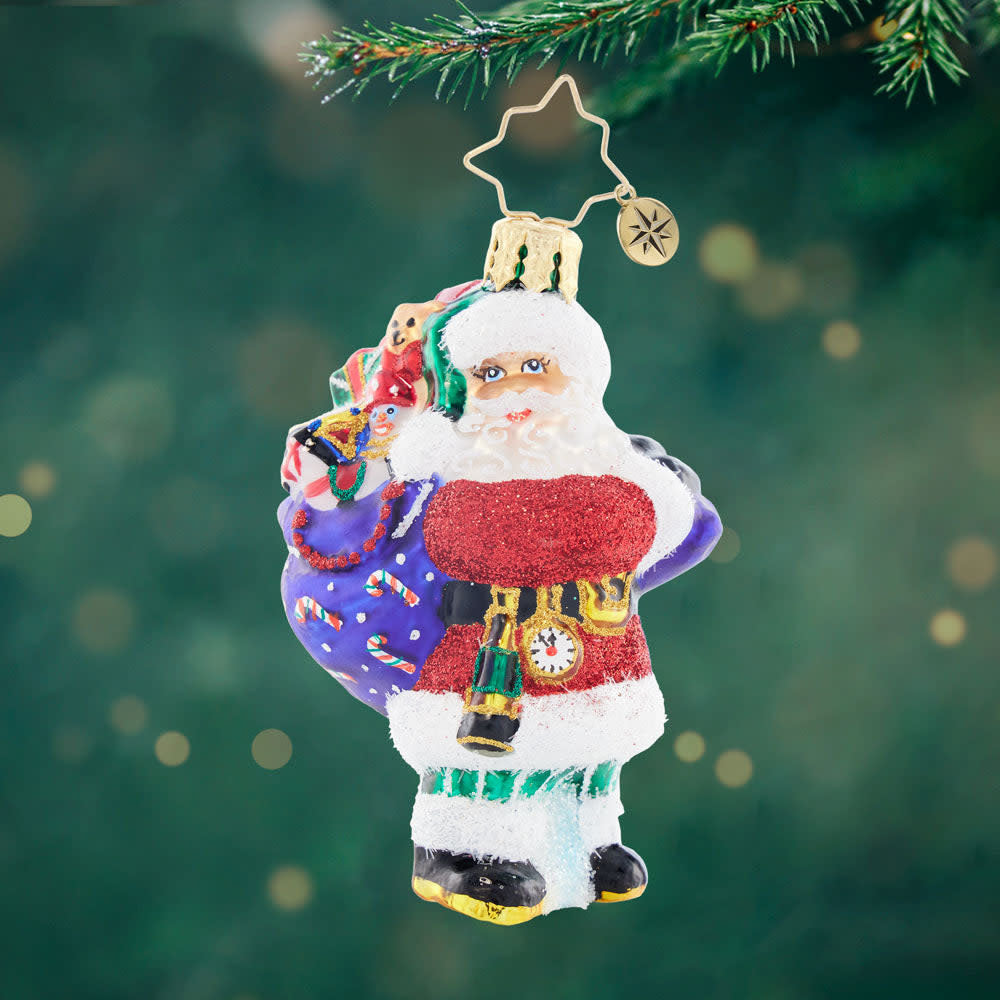 Gem featuring Santa with a festive sack and golden pocket watch; dimensions are 3 inches high.