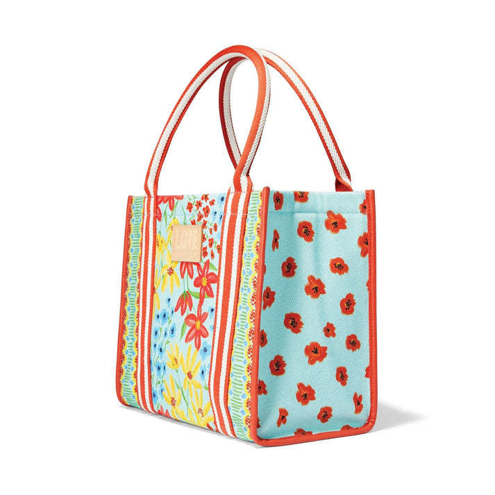 Painterly Garden Canvas Carryall tote with floral collage print, detachable straps, and roomy silhouette.
