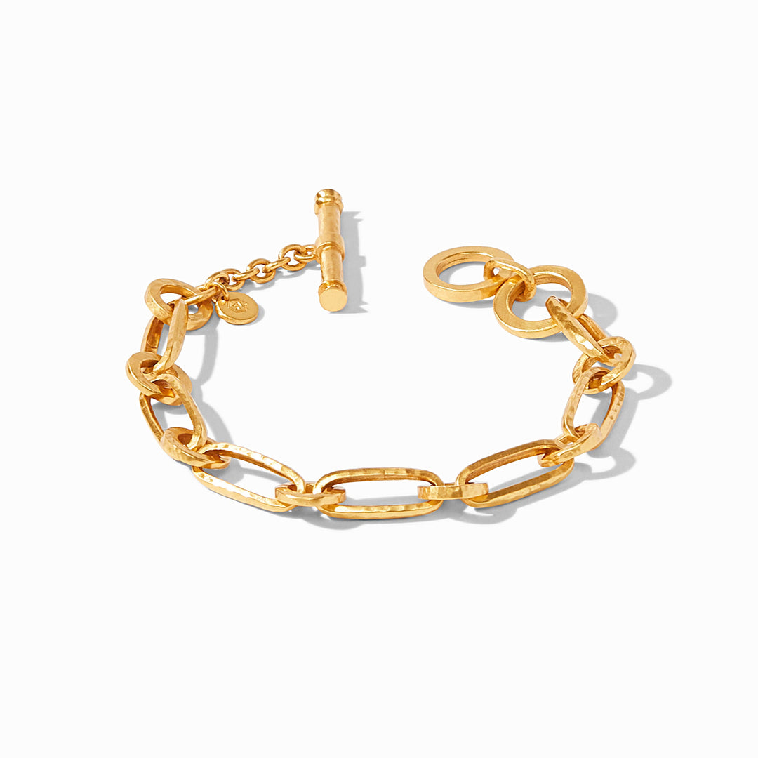 Gold Palladio link bracelet with hammered oval links, adjustable toggle closure, and Julie Vos hallmark.
