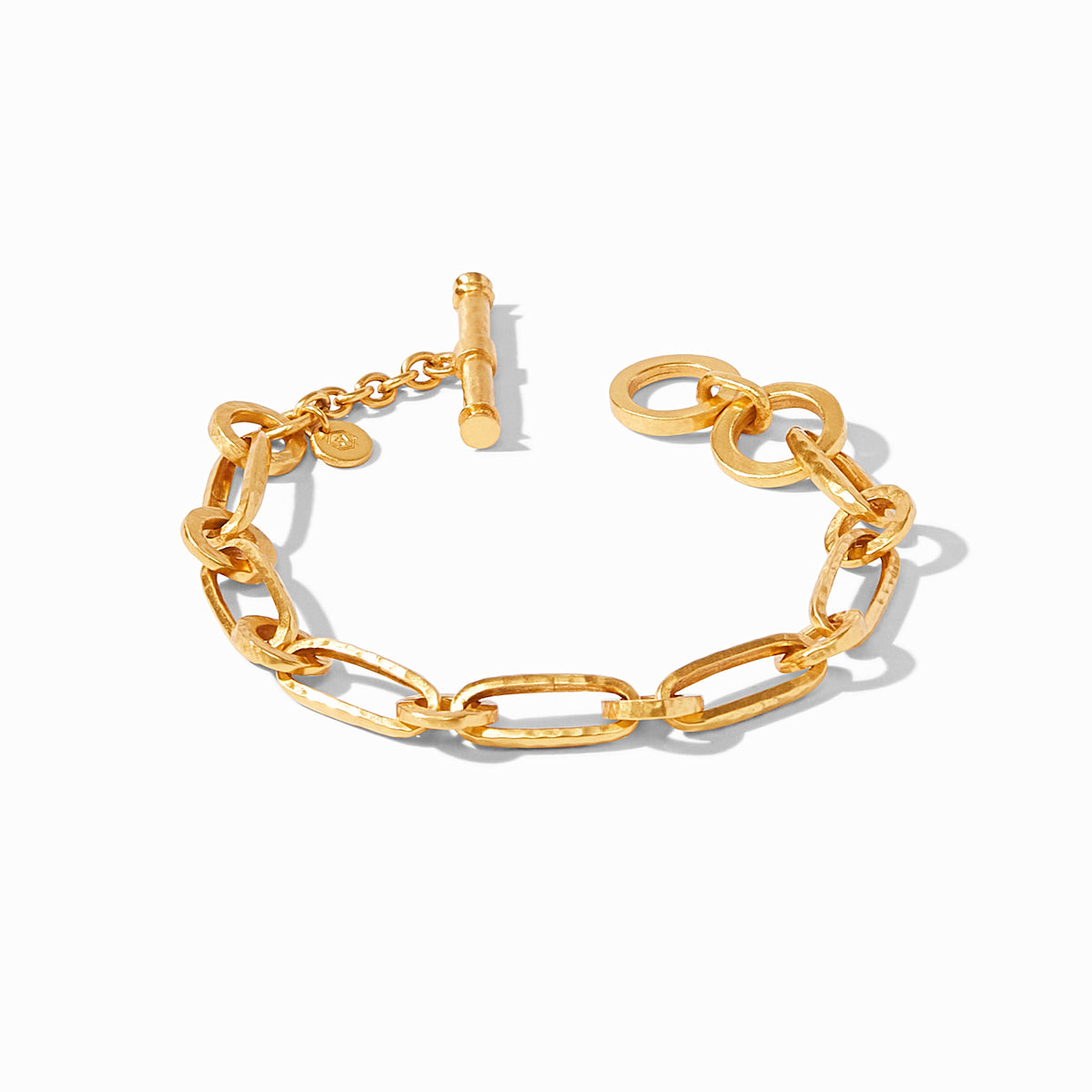 Gold Palladio link bracelet with hammered oval links, adjustable toggle closure, and Julie Vos hallmark.