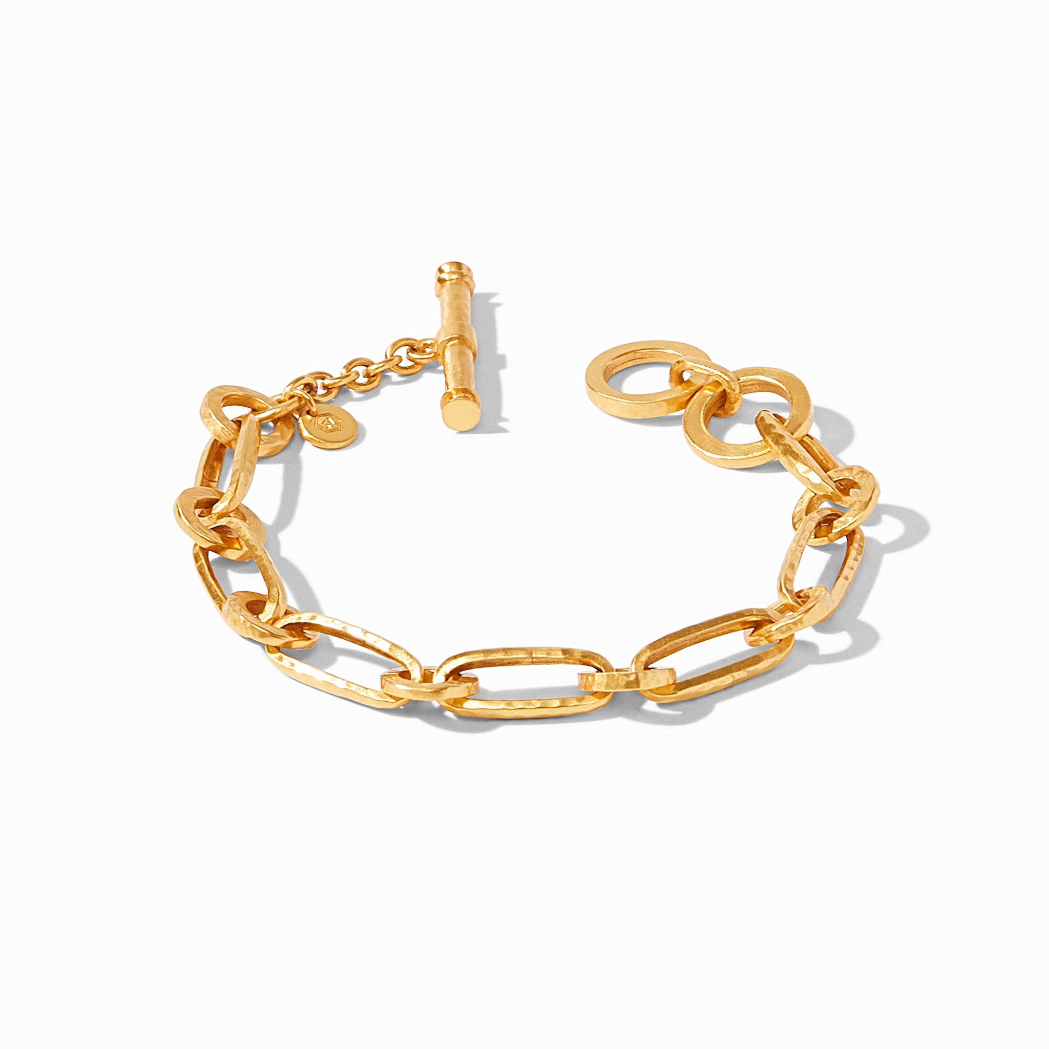 Gold Palladio link bracelet with hammered oval links, adjustable toggle closure, and Julie Vos hallmark.