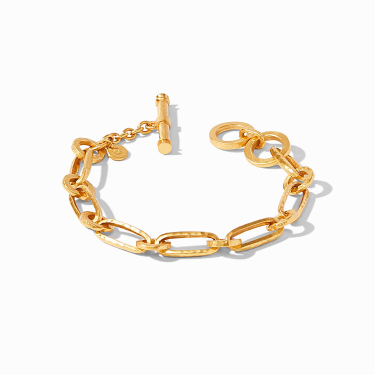 Gold Palladio link bracelet with hammered oval links, adjustable toggle closure, and Julie Vos hallmark.