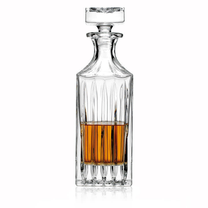 Clear crystal whiskey decanter with multifaceted vaulted cut-glass design