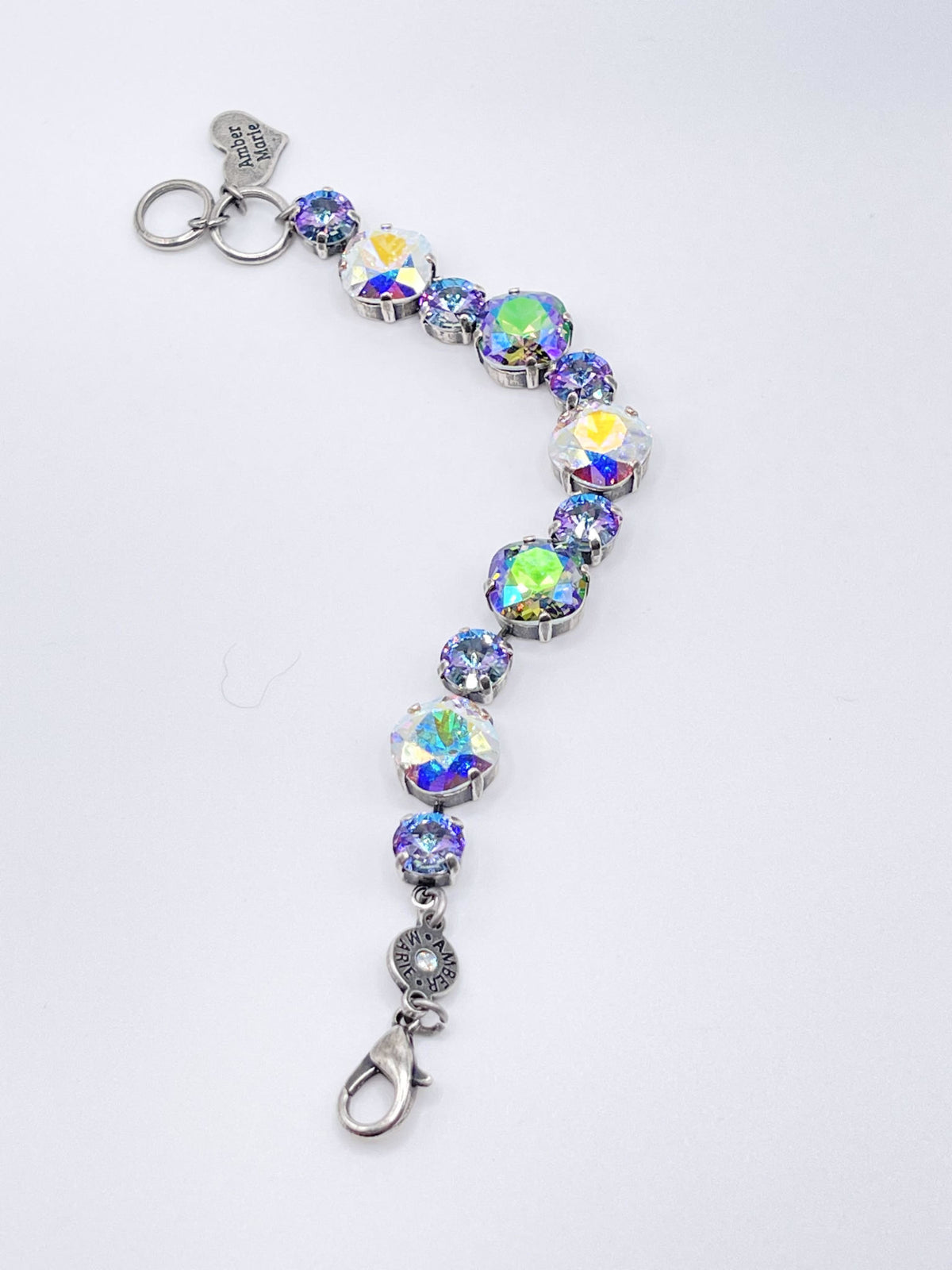 Paris Premier bracelet featuring iridescent crystal stones in silver settings with branded charms.