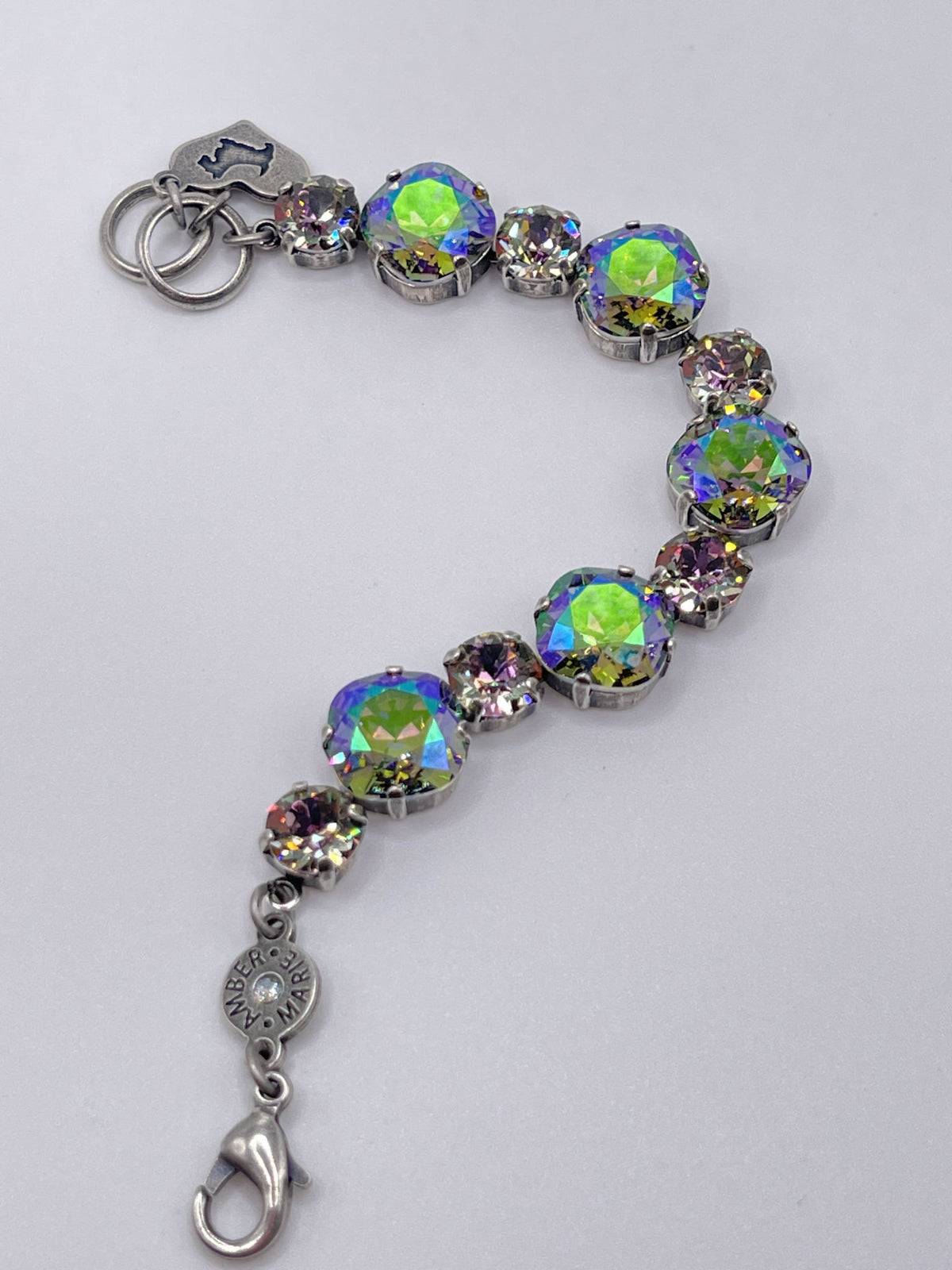 Premier Bracelet in Paris featuring a delicate chain with pearl accents.