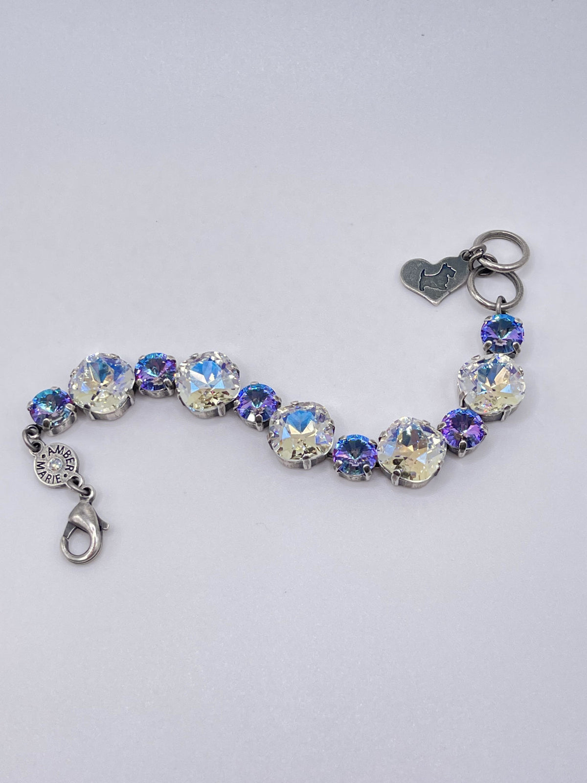 Premier Bracelet Paris in silver metal with a delicate chain link pattern.