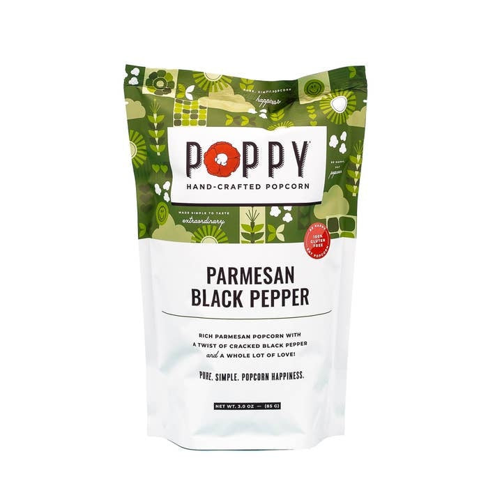 Front view of Market Bag Popcorn in white cheddar vinegar dill flavor with visible seasoning.