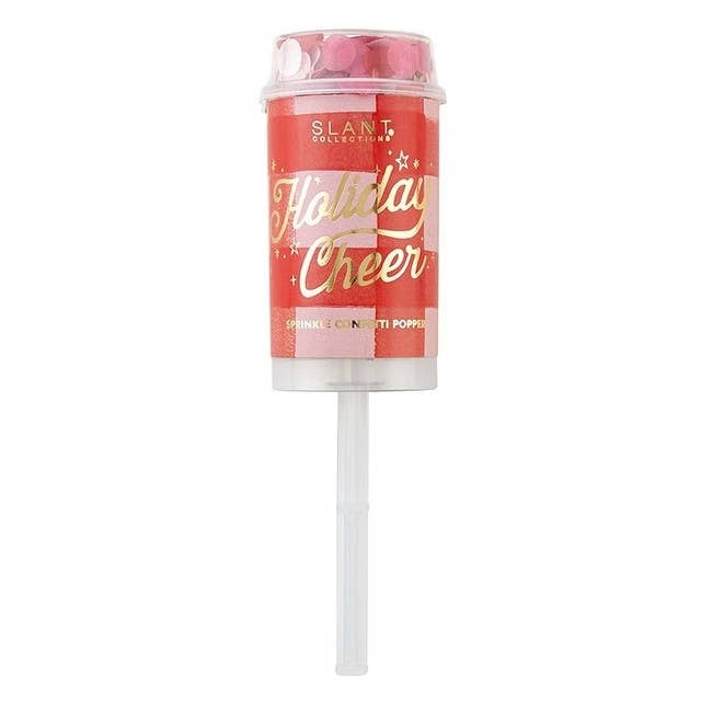 Red party popper with gold confetti streamers in a festive holiday cheer silhouette.