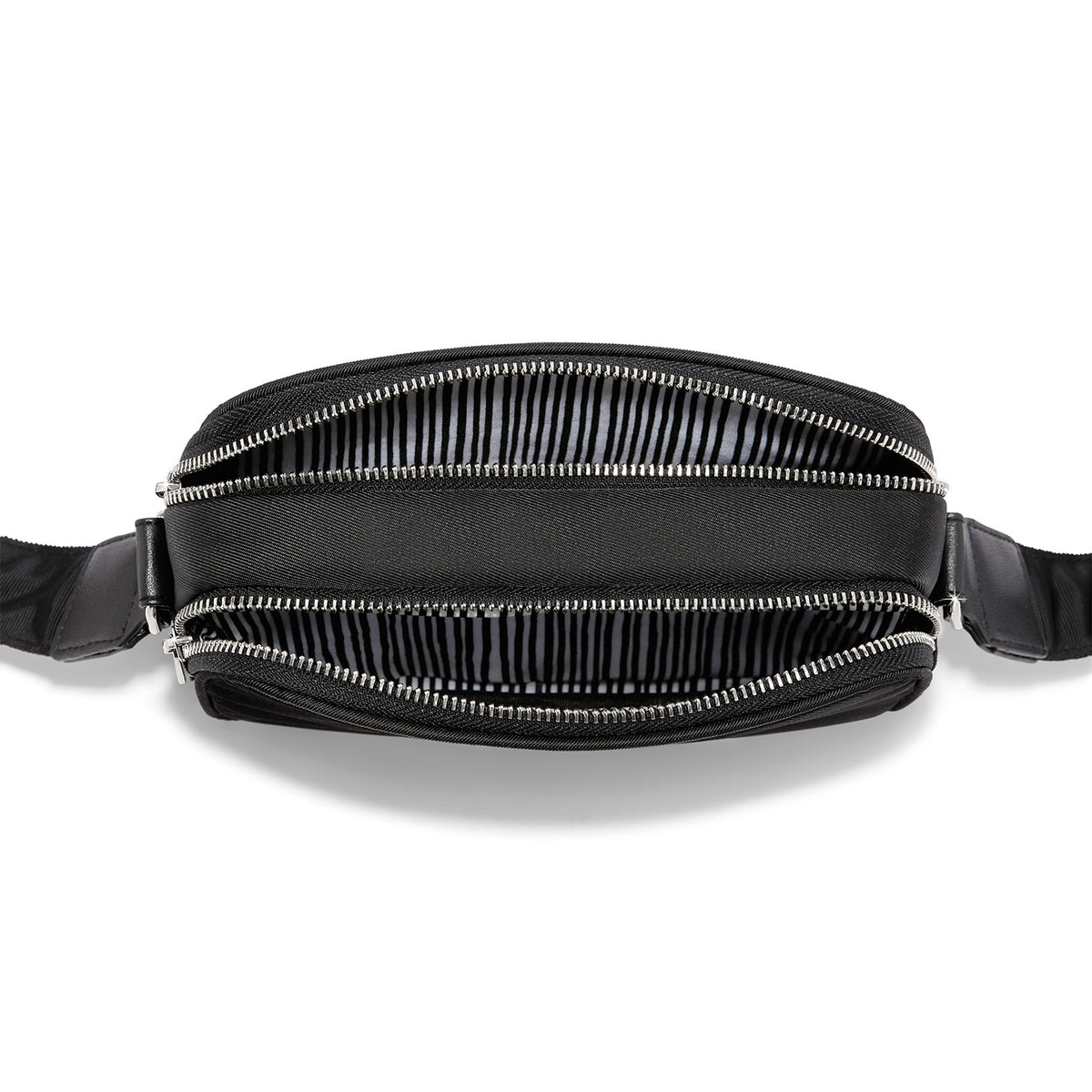 Top view of a black Love Essentials Cross Body Bag showing two open zippered compartments.