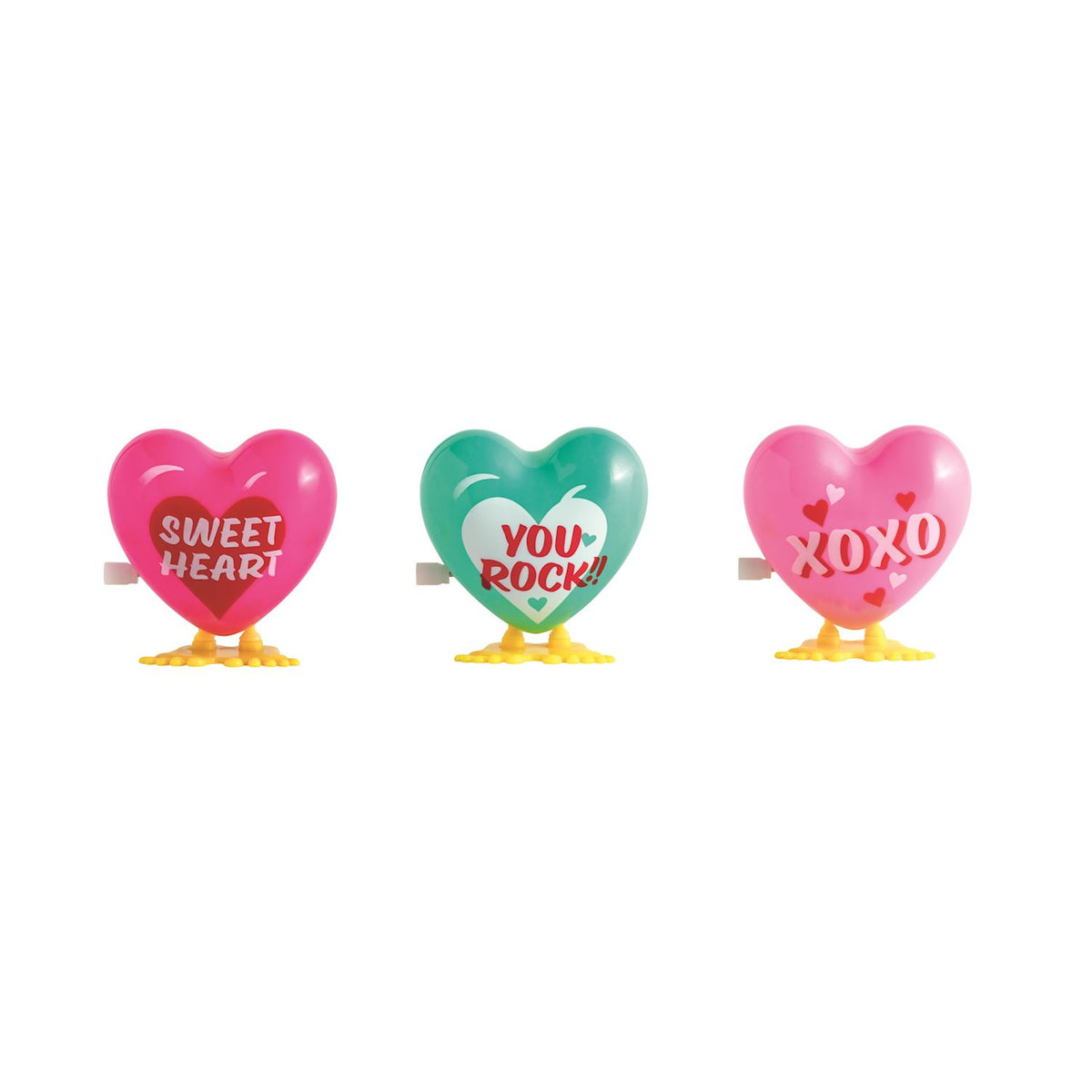 Three wind-up hopping heart toys in pink and teal with messages: Sweet Heart, You Rock, and XOXO.