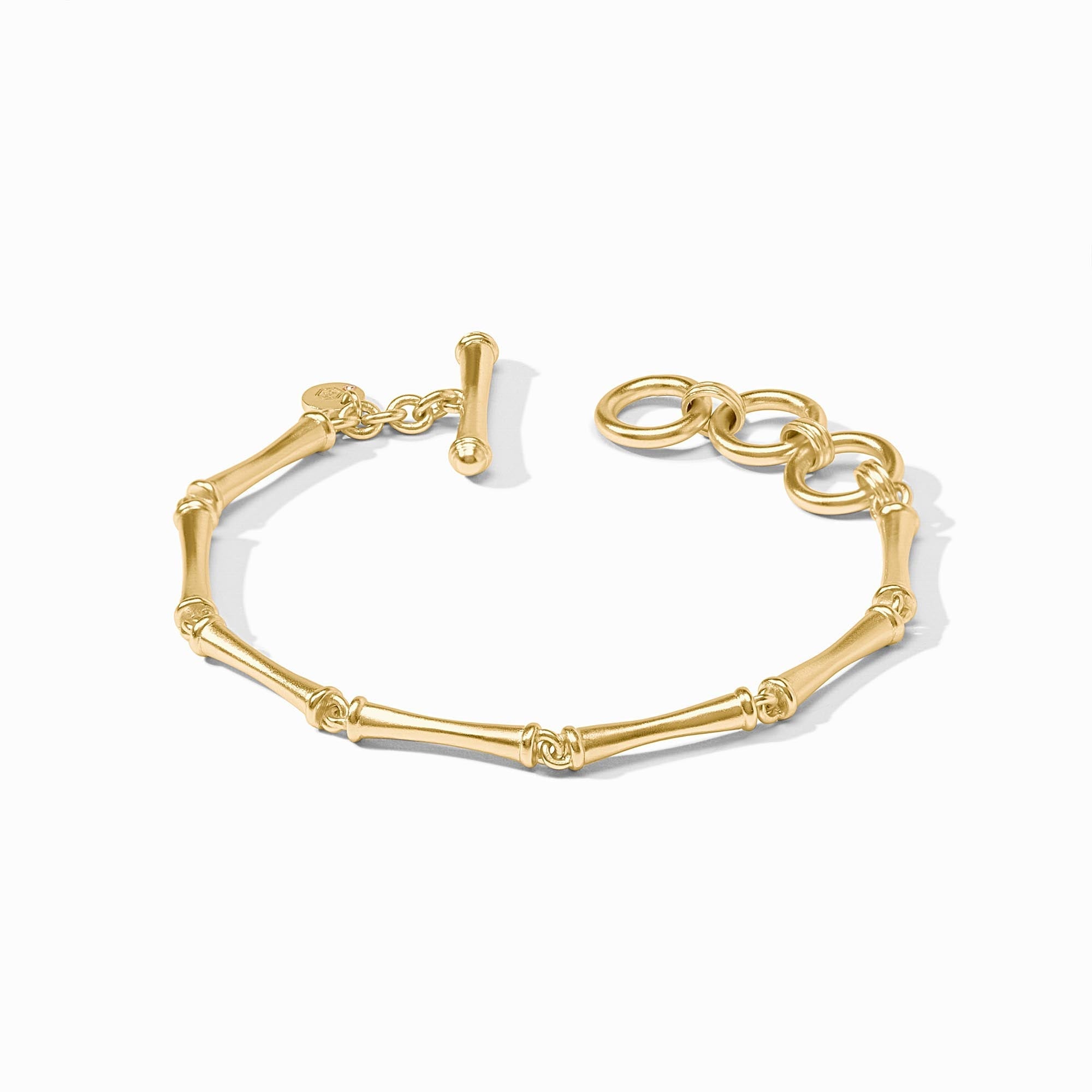 Adjustable bamboo bracelet with 24K gold plating, toggle clasp, and Julie Vos hallmark.