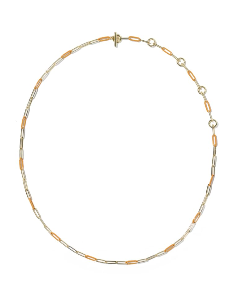 Courtney necklace with alternating 14k gold-plated and orange enamel paperclip links and toggle.