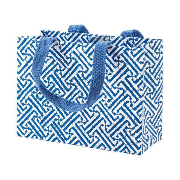 Small blue gift bag with a strong handle made from durable printed paper.
