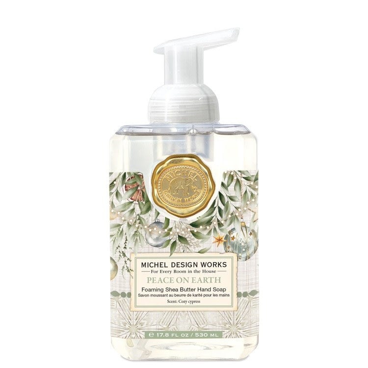 Foaming hand soap in a clear bottle with white liquid inside.
